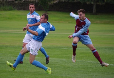 Emley's Max Leonard strikes for goal