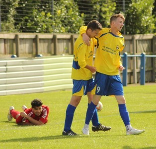 Mark Simpson congratulates Danny Harris after Garforth broke the deadlock. Picture: Steve Richardson