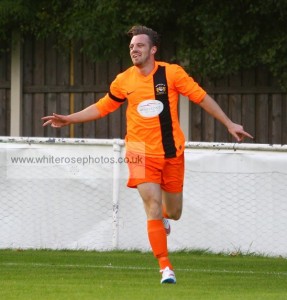 Game over: Scott Turner wheels away after scoring Athersley's third. Photo: WhiteRosePhotos.co.uk