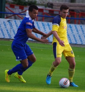 Pickering striker Calum Ward (right) suffered a bad injury on Tuesday night