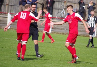 Danny Bunch gives Ash Hope a high-five after his 18th minute strike