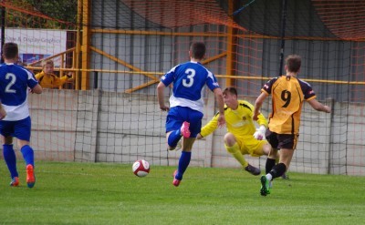 Connor Bower slots the ball past Tom Goodwin to put Albion ahead