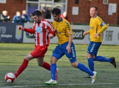 Josh Meade tracking a Romulus player during Stocksbridge's 1-1 draw. Picture: Gillian Handisides