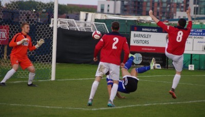 Adam Priestley's overhead kicks sails towards goal