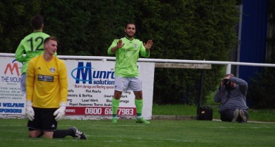 Ash Flynn celebrates his equaliser