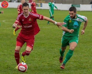 Ross Shelton looks to start an attack for Ossett Town in the 1-1 draw with Brighouse Town. Picture: Mark Gledhill