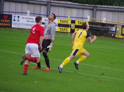 Goalkeeper Tom Metcalfe realises that he is beaten for the second goal