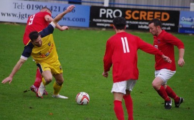 Tadcaster midfielder Jason Mycoe is fouled