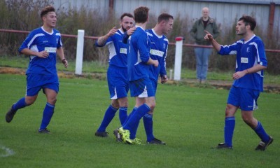 Blythen is congratulated by his team-mates