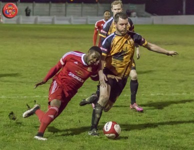 Albion goal-scorer Dom Riordan tracks Town winger Cameron Lyn. Picture: Mark Gledhill