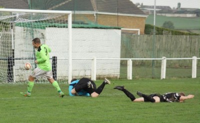 Ash Flynn turns away after scoring his 51st goal of the season in AFC Emley's 1-1 draw at Penistone Church. Picture: Mark Parsons