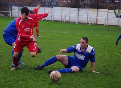 Adam Shaw looks to set an attack up for Yorkshire Amateur