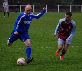 Hallam attacker Steve Brammer prepares to launch the ball upfield 