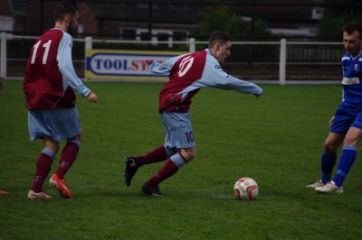 Goal-scorer Jordan Coduri on the attack for Emley