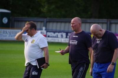 Farsley boss Neil Parsley prepares to make his break for it in the hide and seek competition at Tadcaster