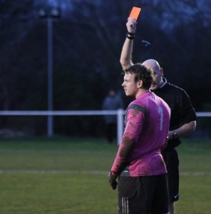 Already booked Winterton goalkeeper Adam Stevens sees red after throwing the ball at Jonty Maulin's head.