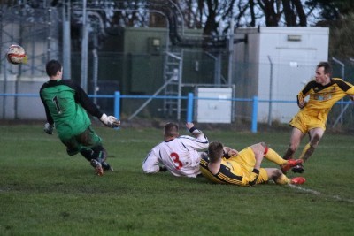 Brad Walker scores his fourth in Knaresborough's 6-0 win at Yorkshire Amateur. Picture: Craig Hinsdale