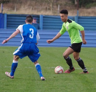 Ruben Jerome takes on Eccleshill left-back Marcus Harper