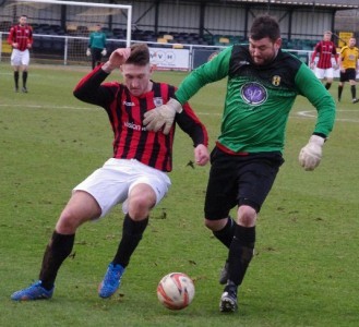 Ratcliffe won this battle with Maltby's Handsworth academy graduate Ryan Carroll, but earlier he escaped without conceding a penalty after flying through the back of the striker 