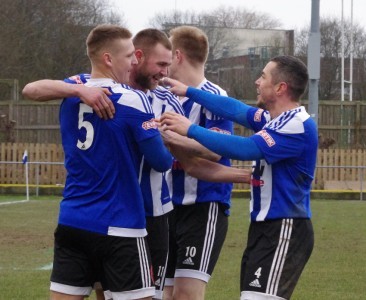 Lee Bennett celebrates his opener for Shaw Lane