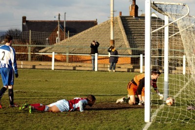 Ash Flynn looks down at the ball after scoring his hat-trick. Picture: Mark Parsons