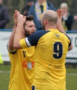 Jason Mycoe congratulates hat-trick hero Jimmy Beadle during Tadcaster's 5-0 win over Retford. Picture: Keith Handley