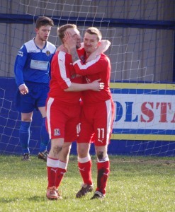 Luke Harrop celebrates his goal with Charlie Flaherty