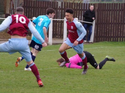 Ruben Jerome runs off to celebrate his goal