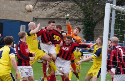 Cleethorpes goalkeeper Liam Higton punches one of a succession of Tadcaster corners clear