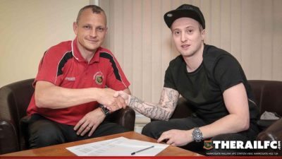 Chris Ovington shakes hands with Harrogate Railway manager Lee Ashforth. Picture: Caught Light Photography