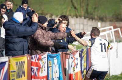 Former Manchester United midfielder Jonathan Greening runs to Tadcaster's supporters to celebrate his goal. Picture: Ian Parker