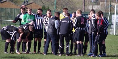 Ian Richards and his Penistone players congratulate each other at the end