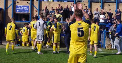 Gregg Anderson leads the applause of Tadcaster's travelling support