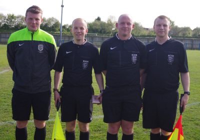 The officials, Sam Barrott (fourth official), Ricky Taylor, Kelvin Sarsfield (referee) and Paul Bell