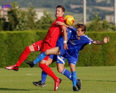 Parkgate midfielder Ross Shelton in action against his former side Ossett Town in pre-season. Picture: Mark Gledhill