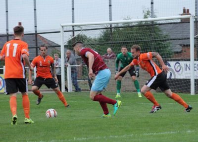 AFC Emley captain Kieran Ryan probes Brighouse's defence. Picture: Mark Parsons