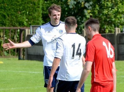 Adam Boyes celebrates scoring his goal in Guiseley's 3-0 win at Parkgate. Picture: John Rudkin