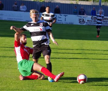 New Railway midfielder Gregg Porter tackles former Farsley man Lewis Nightingale