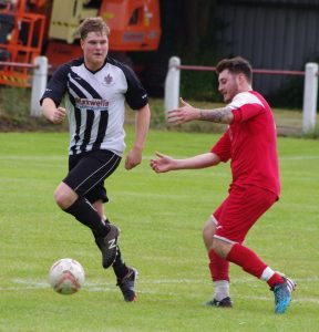 Nathan Perks attempts to close down a Northallerton defender