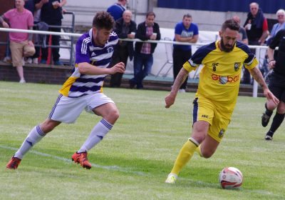 Jonathan Greening moves away from Hemsworth midfielder Sam Jones