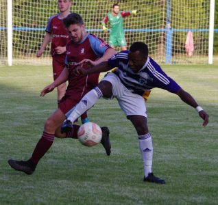 Brice Tiani in battle during Hemsworth's 4-4 draw with Ossett Albion