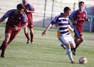 Ross Haywood plays a pass 