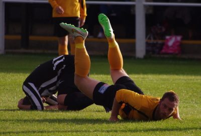 Handsworth defender Sam Denton looks up after committing a foul on a Penistone player