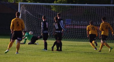 Denton's free kick beats Penistone goalkeeper Joe Green