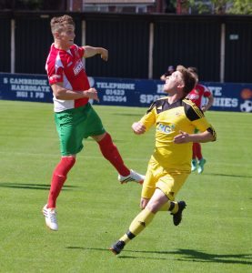 Spot the ball: Railway winger Ryan Sharrocks and Knaresborough defender Byron Littlefair in action