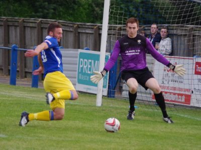 Aiden Savory is denied by superb Garforth Town goalkeeper Paul Hagreen