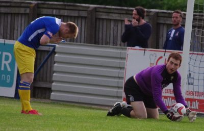 Walshaw bows his head in shame after missing a sitter