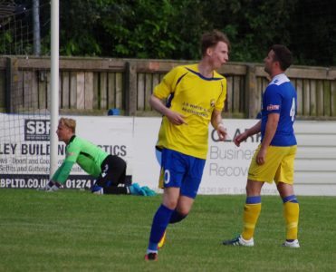 Simpson turns away after scoring