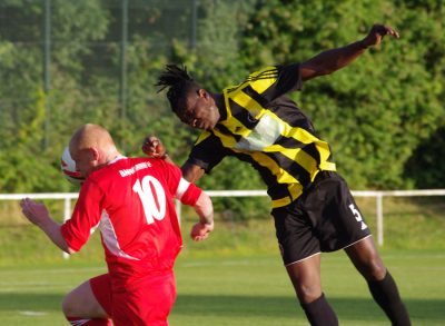 Nostell defender Franck Zalo misses his header which sets Wells away