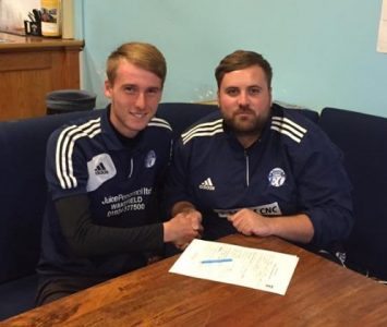 Harry Viggars shakes hands with Hemsworth assistant secretary Phil Crapper